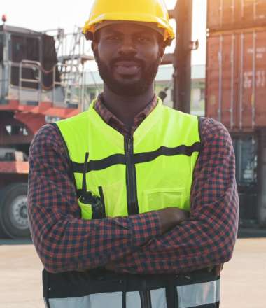 Worker African american in container loading station import export large cargo shipment